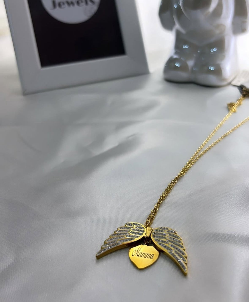 Collana Ali incisione